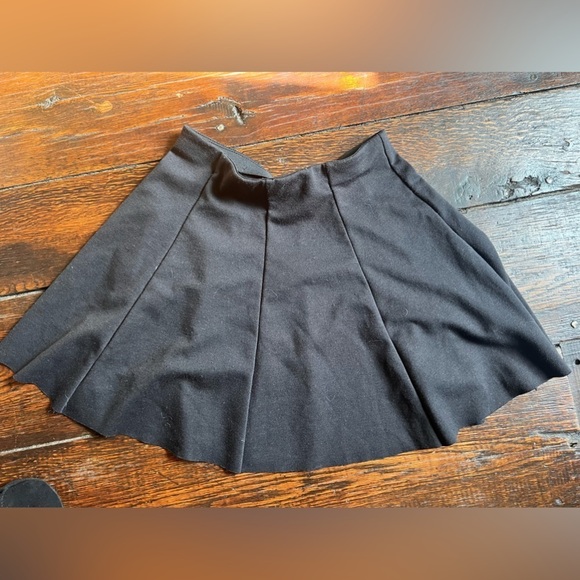 Brandy Melville Dresses & Skirts - Brandy Melville black mini skirt fits like size small or size 2